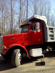 Red dump truck used for hauling
